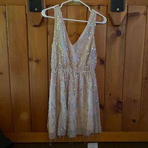 Nude cocktail dress with multicolored sequins